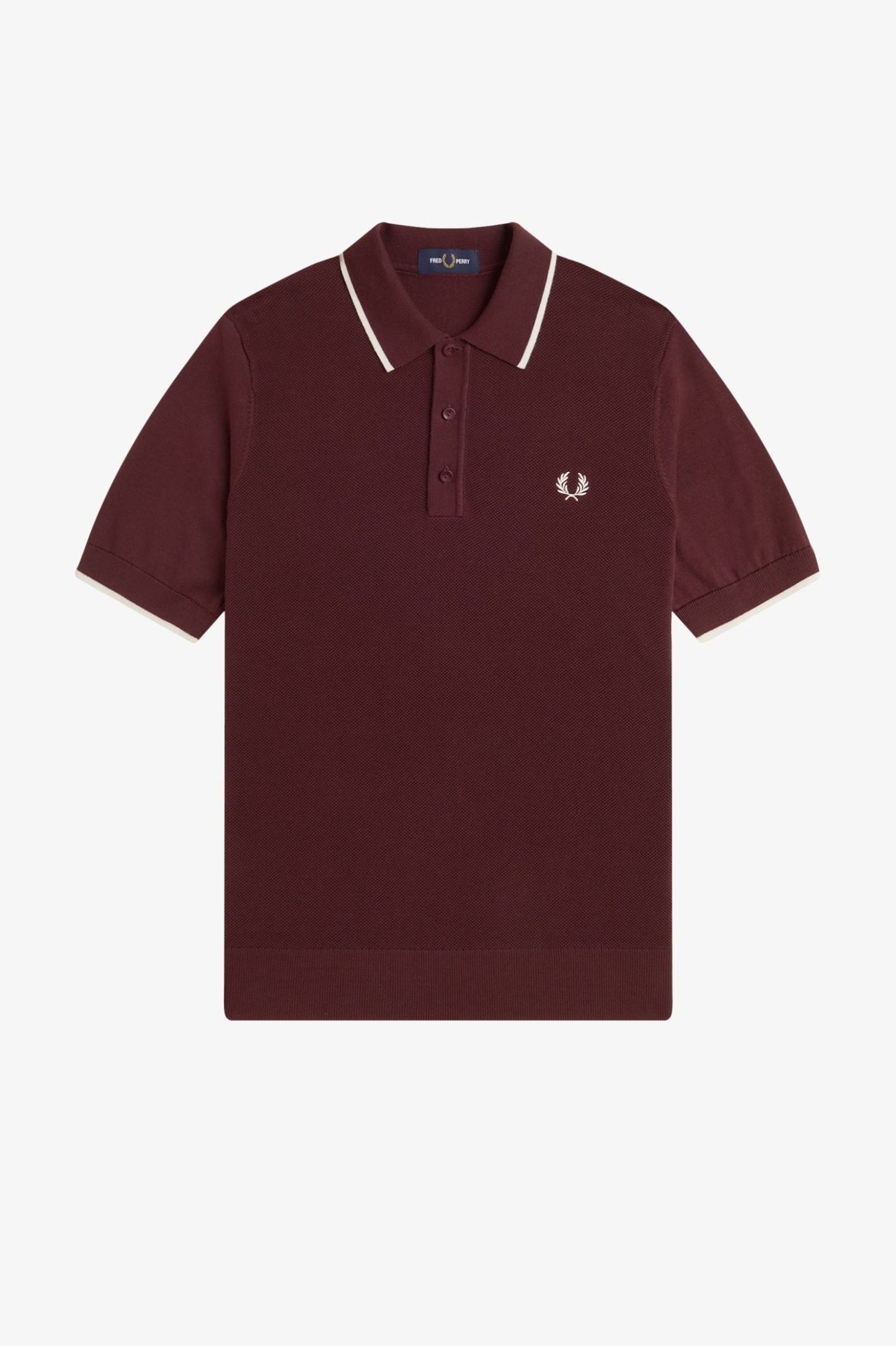 Maroon polo shirt with white trim on a light gray background