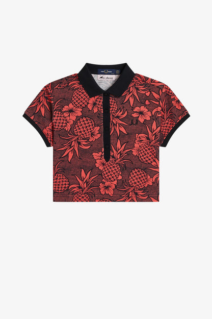 Red floral patterned polo shirt on a white background