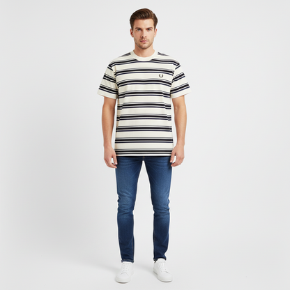 Man wearing a striped t-shirt and jeans on a white background