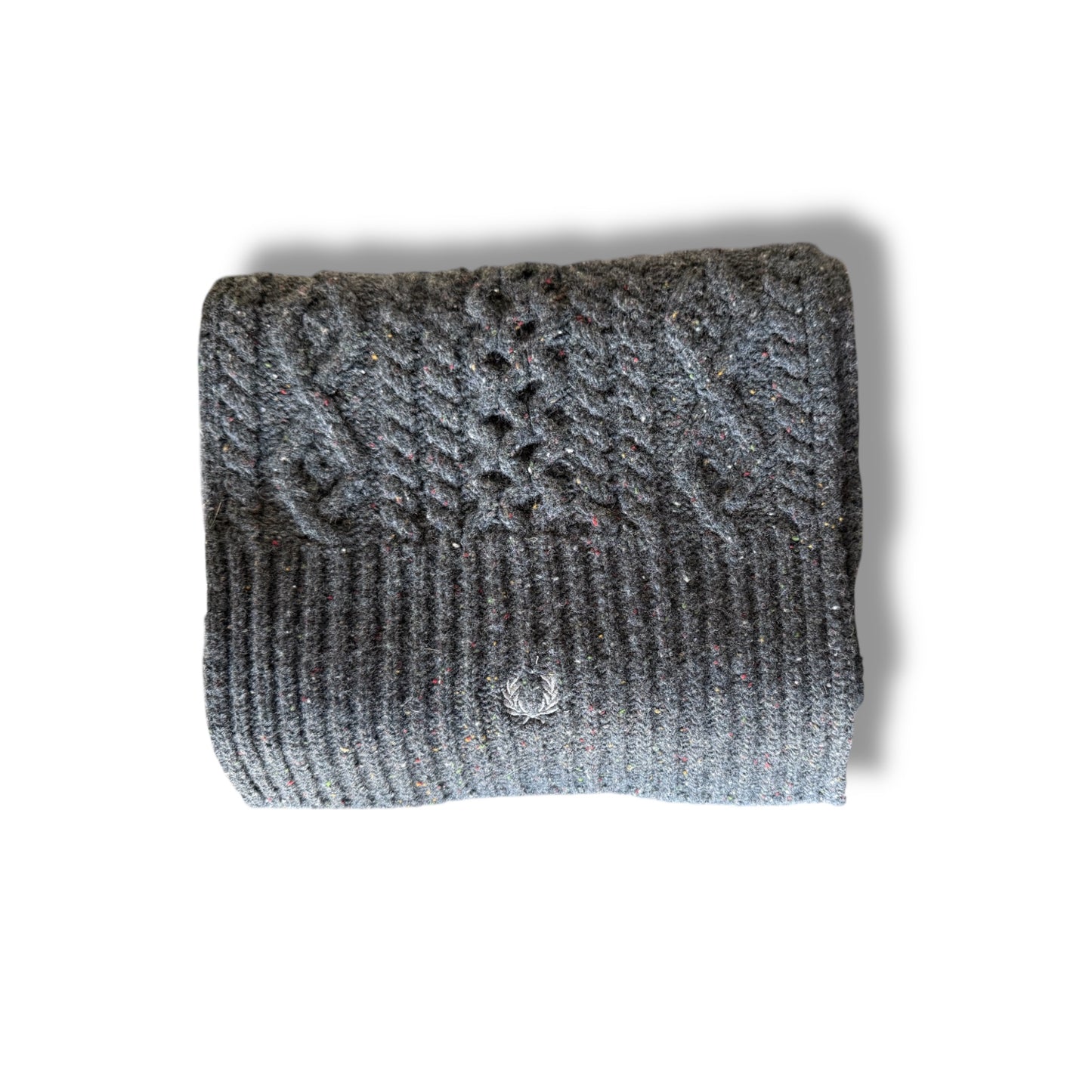 A folded cable knit scarf in a charcoal marl color.