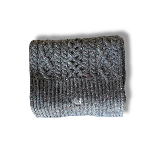 A folded cable knit scarf in a charcoal marl color.