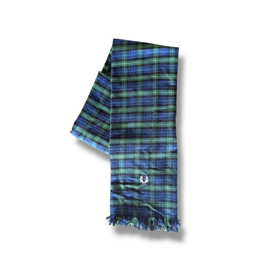 A checkered scarf with blue, brown, white, and green colors, displayed on a plain background.