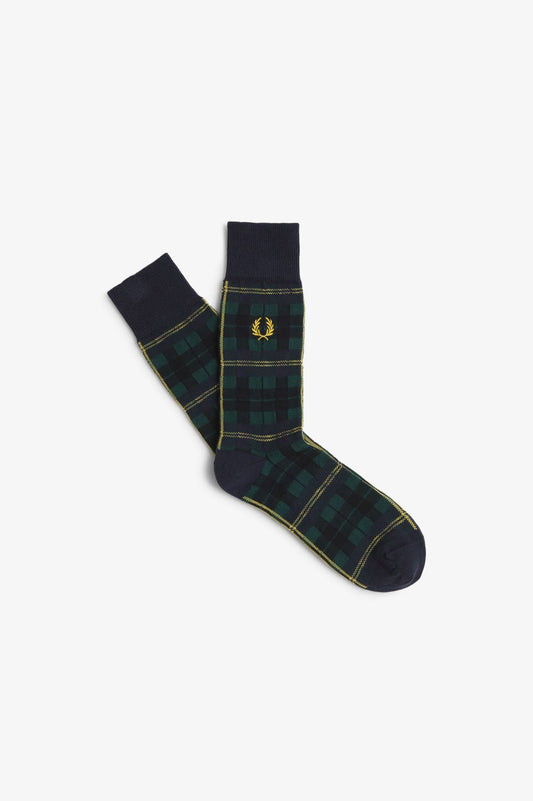 A pair of black Fred Perry socks with the brand's logo on the ankle area.