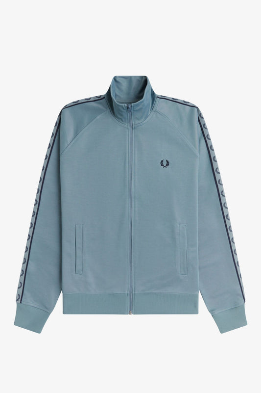 Light blue track jacket with tape details on a white background