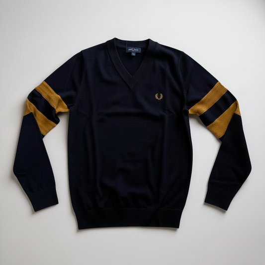 Black sweater with gold stripes on sleeves on a white background
