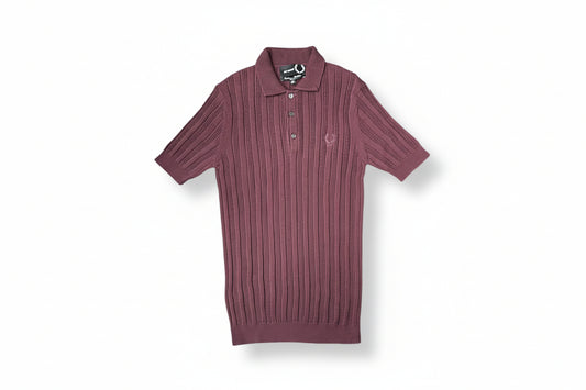 Maroon ribbed polo shirt on a white background