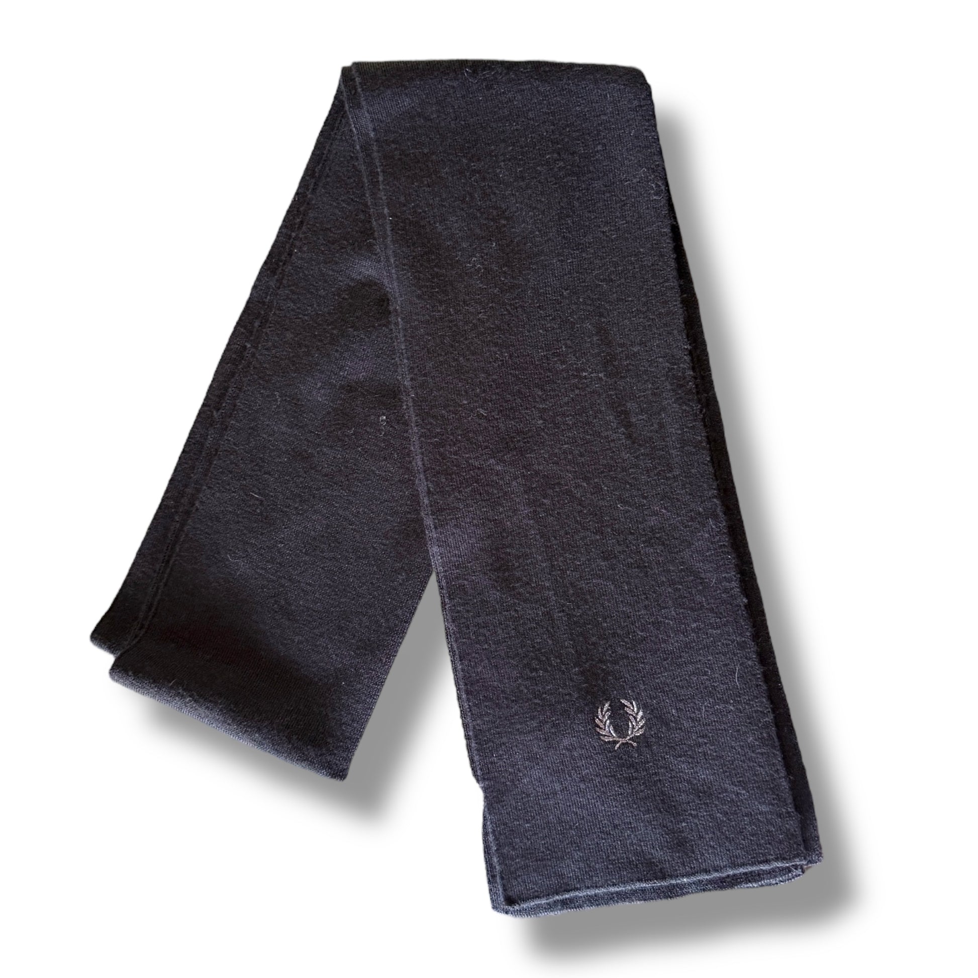 A navy blue scarf with a subtle logo at the corner, displayed on a plain background.