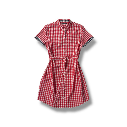 A red and white gingham button down dress with a belt and short sleeves on a white background.