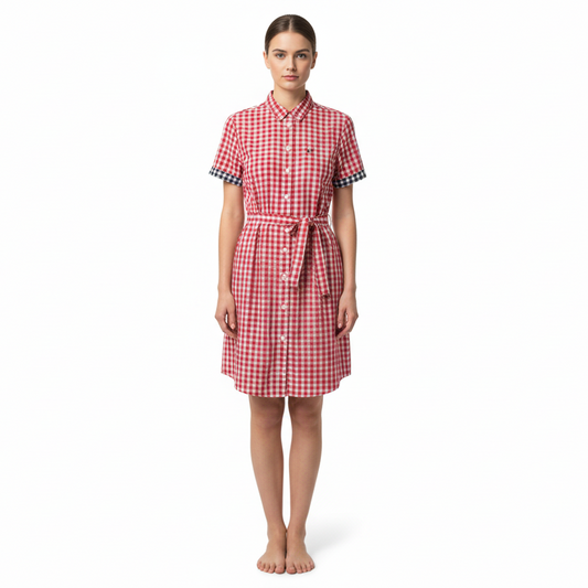 Woman wearing a red and white checkered dress on a white background