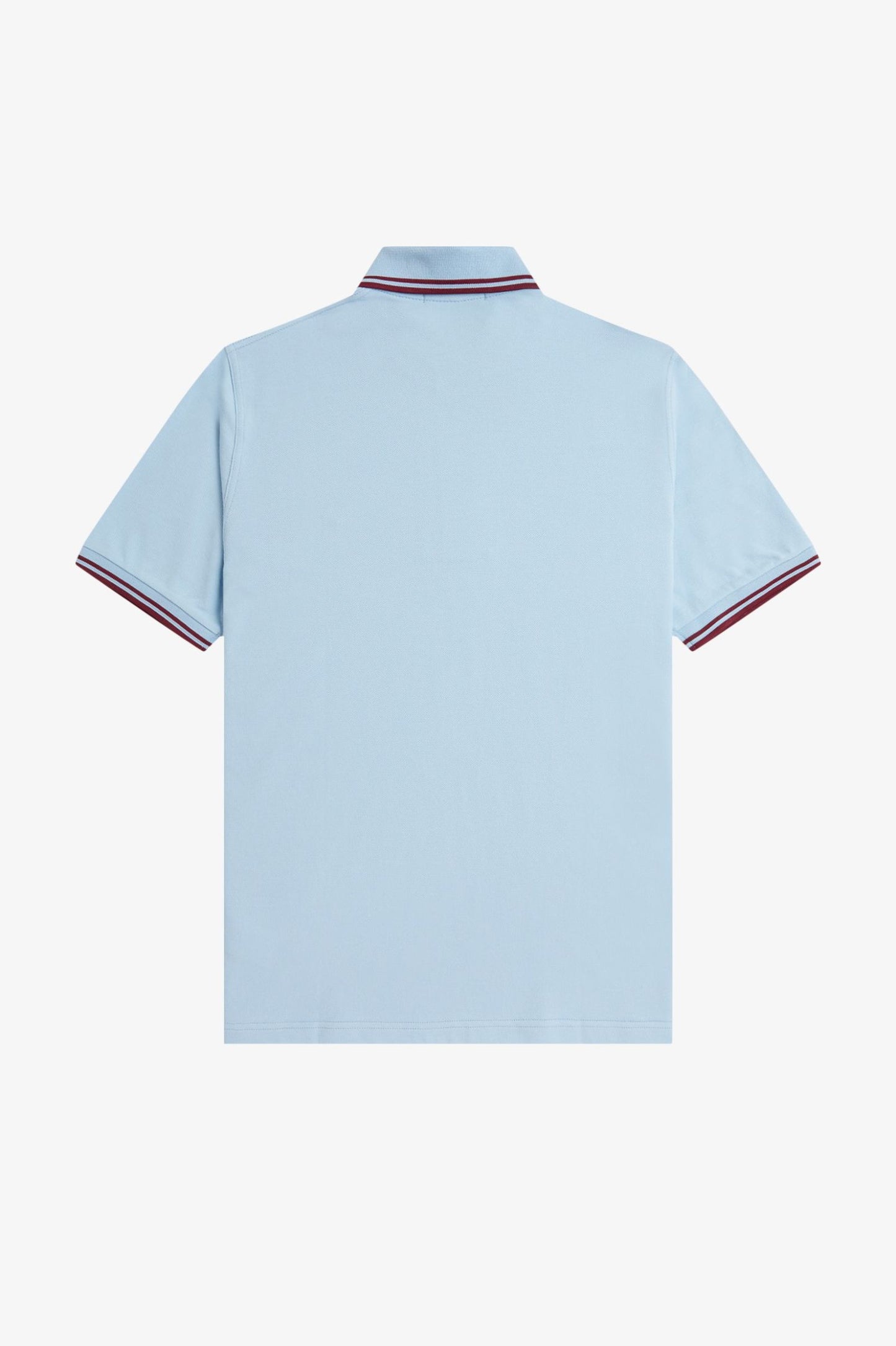 Light blue polo shirt with red and white trim on a white background