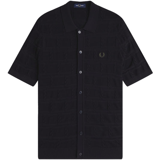 A black Fred Perry cable knitted short sleeve shirt with a crew neckline and a visible brand logo on the left chest.