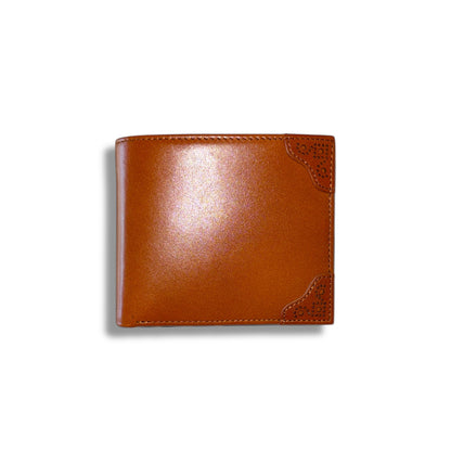 A brown leather wallet with brogue detailing on the corners.