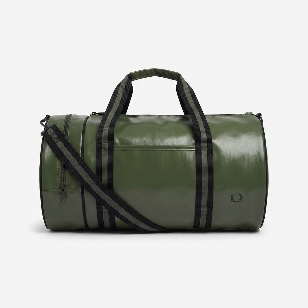 An olive green duffel bag with black handles, a black shoulder strap, and a small black embroidered laurel wreath logo on the front, set against a plain light gray background.