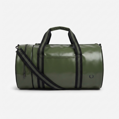 An olive green duffel bag with black handles, a black shoulder strap, and a small black embroidered laurel wreath logo on the front, set against a plain light gray background.