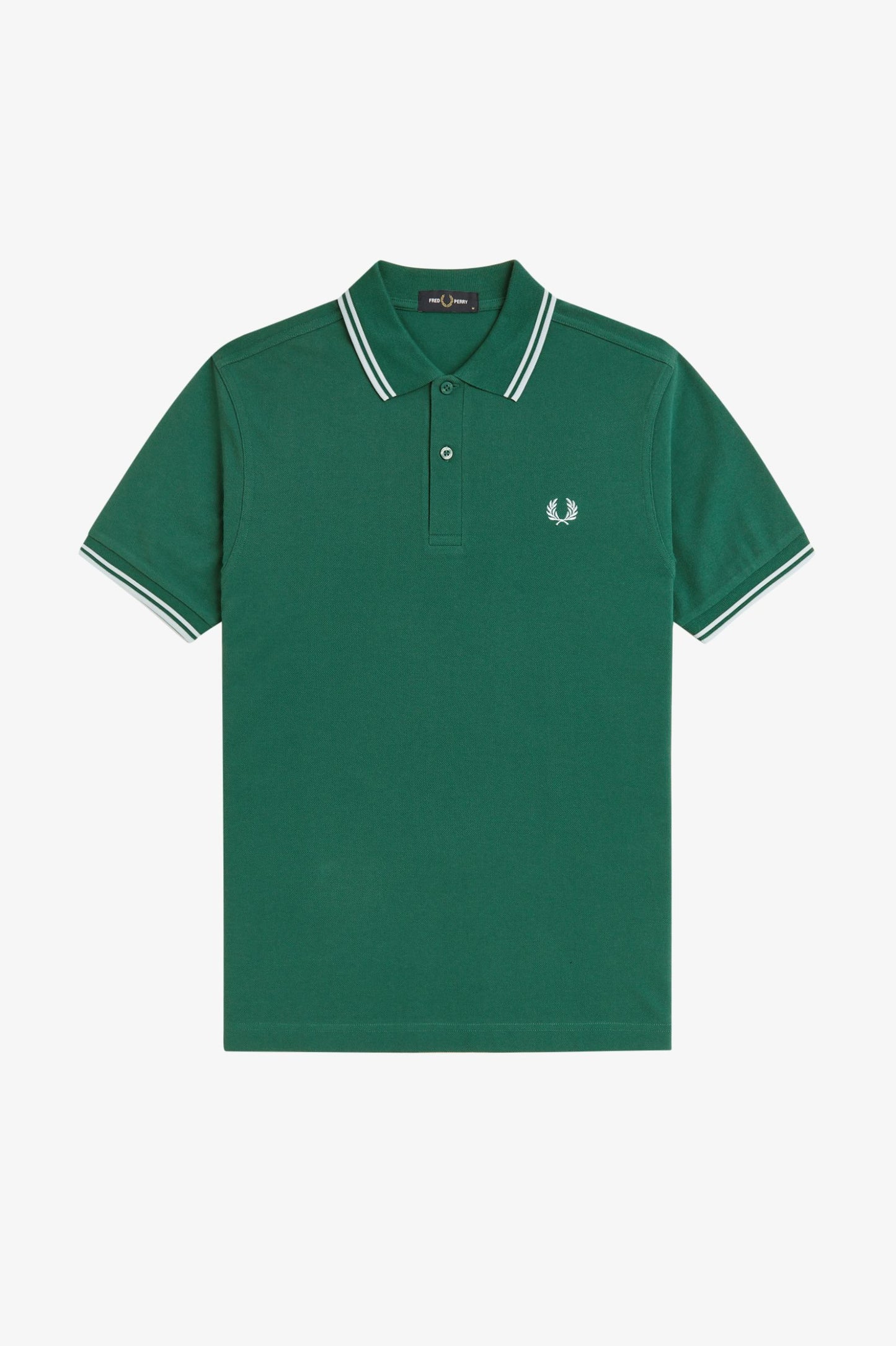 Green polo shirt with white trim on a light gray background