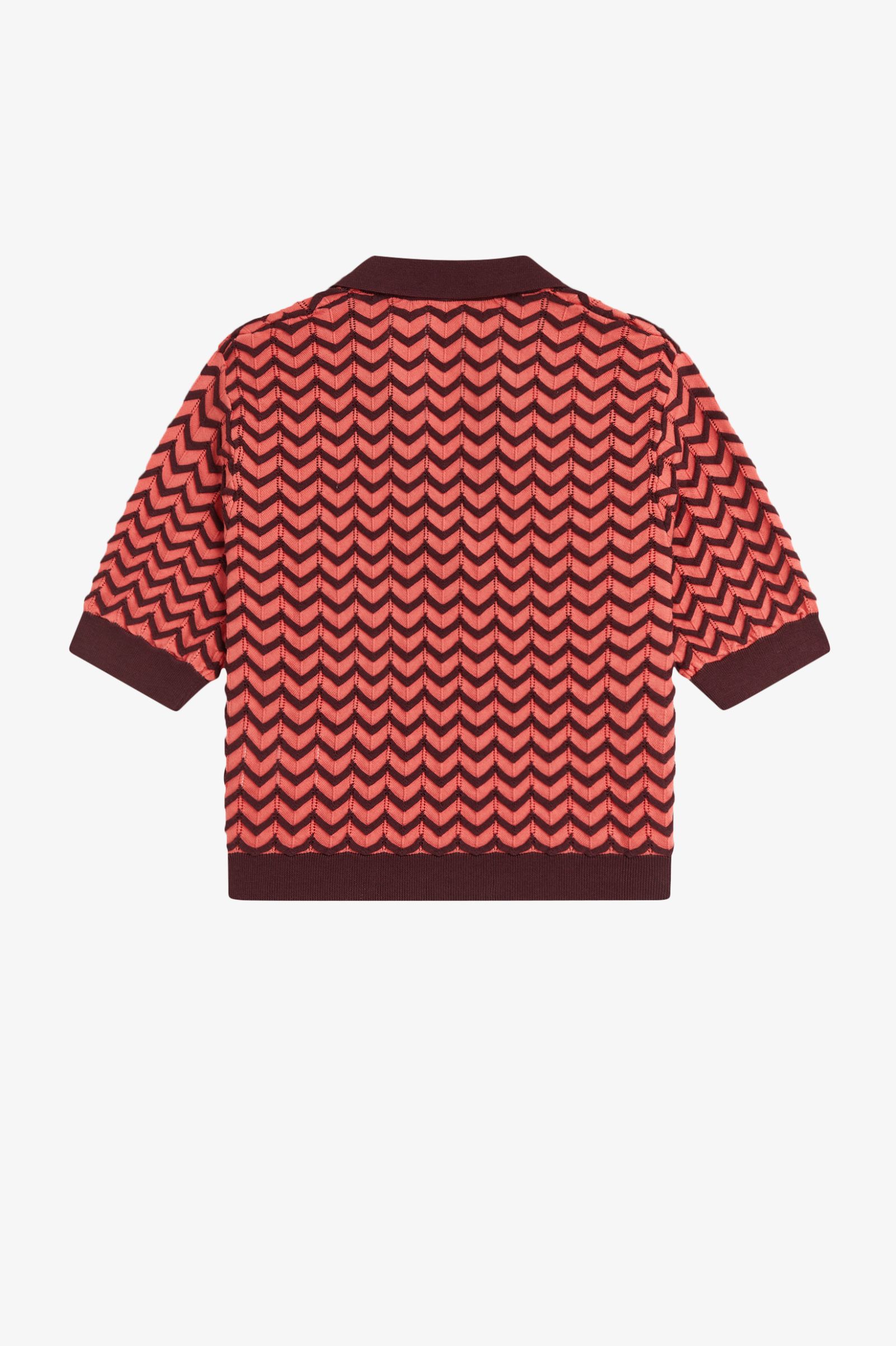 Red and brown patterned shirt on a white background