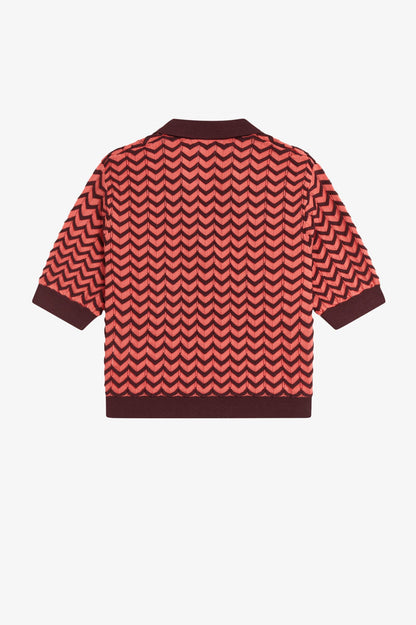 Red and brown patterned shirt on a white background
