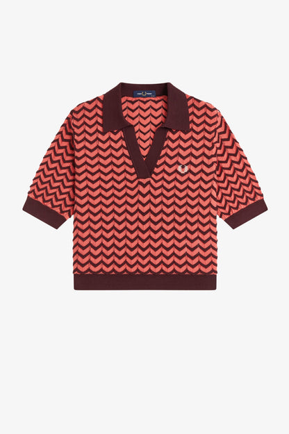 Red and brown patterned shirt on a white background