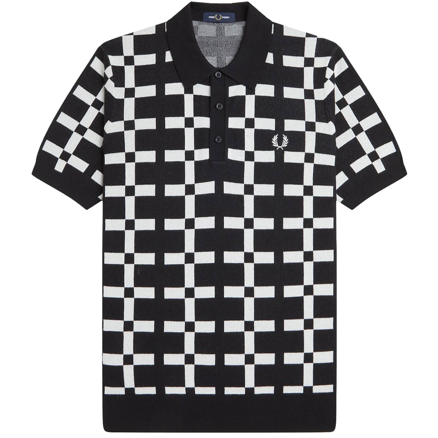 A black and white geometric jacquard knit polo shirt by Fred Perry.