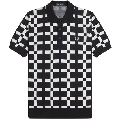 A black and white geometric jacquard knit polo shirt by Fred Perry.