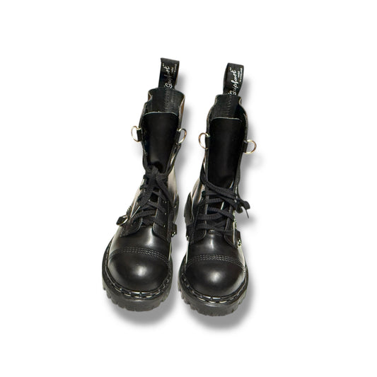 Pair of black leather boots on a white background