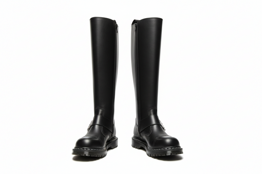 Pair of black knee-high boots on a white background