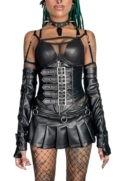 Person wearing lip service  a black leather outfit with a corset and gloves on a white background