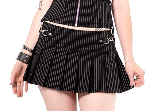 Black pinstripe skirt with metal buckles worn by a person on a white background