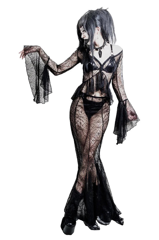 Person wearing a black lace lingerie set on a white background