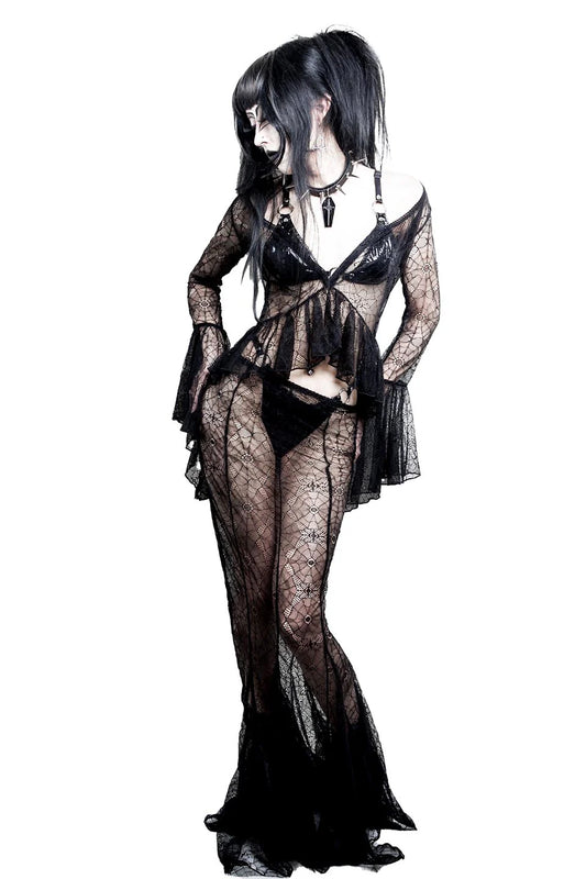 Person wearing a black lace lingerie set on a white background