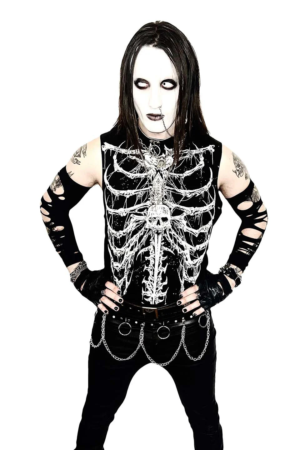 Person wearing a black outfit with skeleton design on a white background