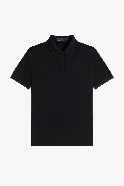 Black polo shirt on a white background