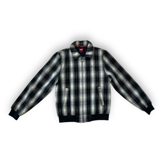 A plaid Merc jacket with a small fit, featuring a front zipper and a kangaroo pocket.