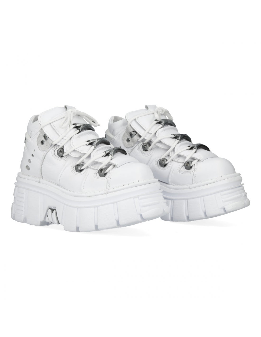White sneakers with thick soles on a white background