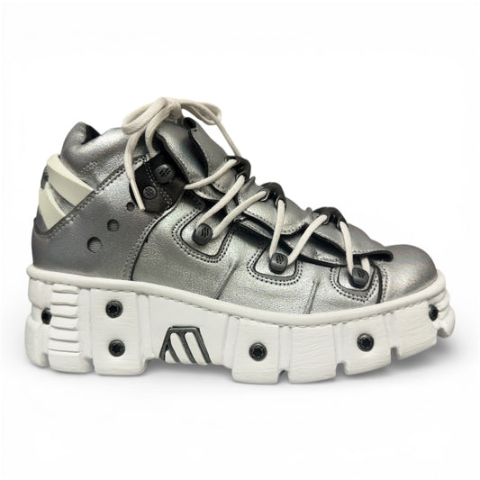 Silver sneaker with white sole on a white background