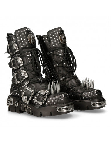 A pair of black New Rock boots with spiked details and metal studs from the METALLIC COLLECTION.