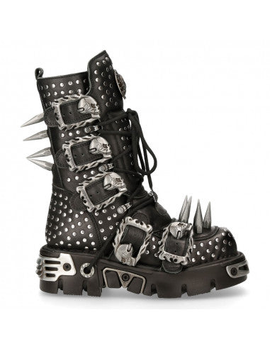 A black leather boot with metal spikes and studs, featuring a high top and a lace-up closure.