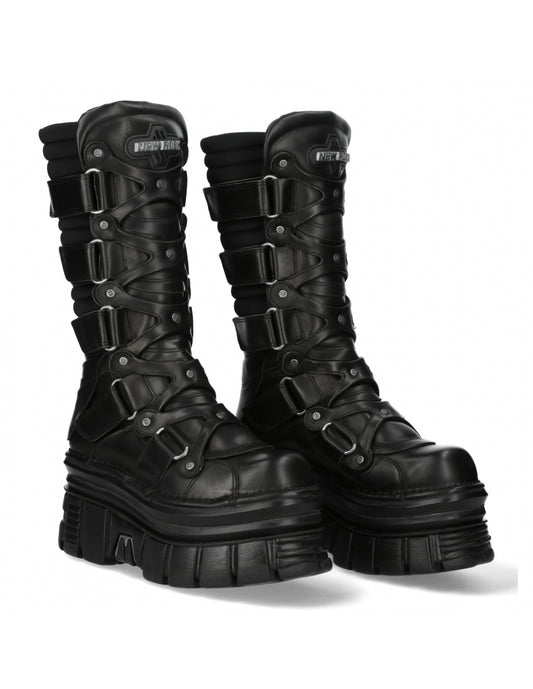 Pair of black leather boots with buckles on a white background