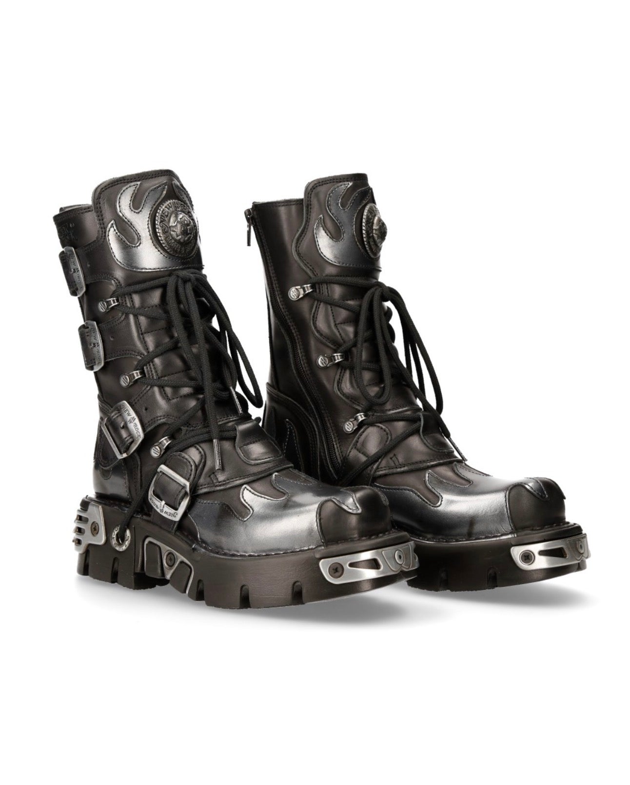 Pair of black and silver high-top boots on a white background