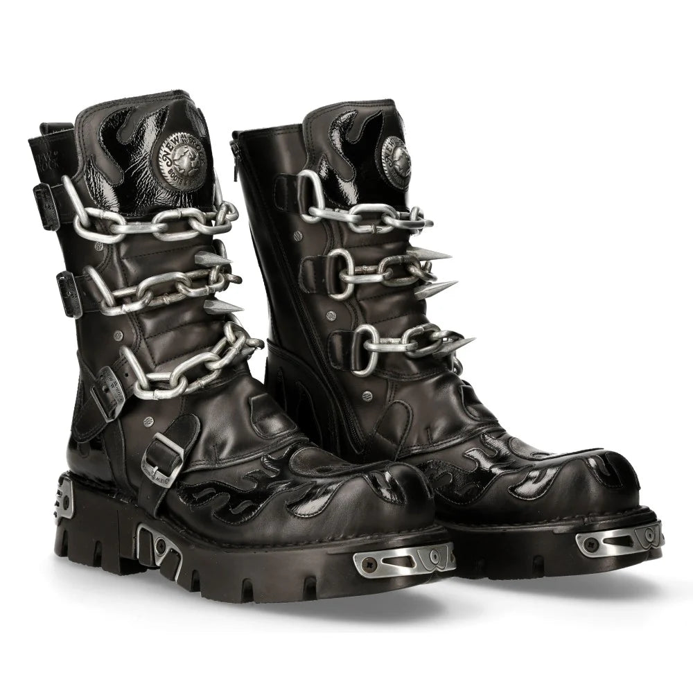 Black leather boots with chain details on a white background