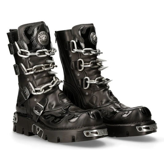 Black leather boots with chain details on a white background