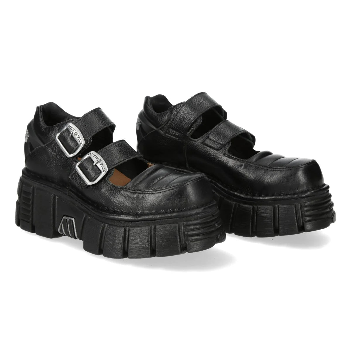 Black platform shoes with buckles on a white background