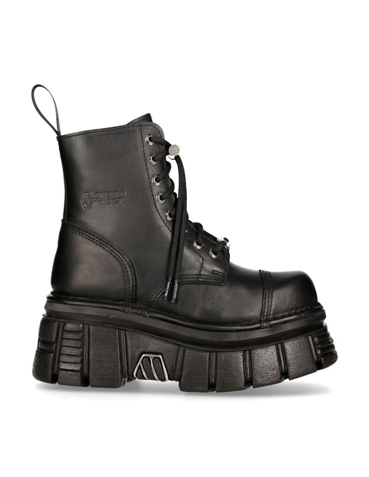 Black leather boot with thick sole on a white background