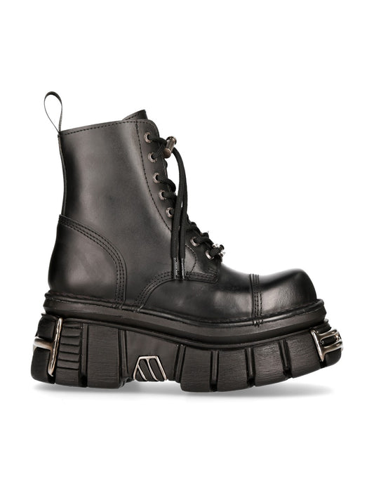 Black leather boot with thick sole on a white background