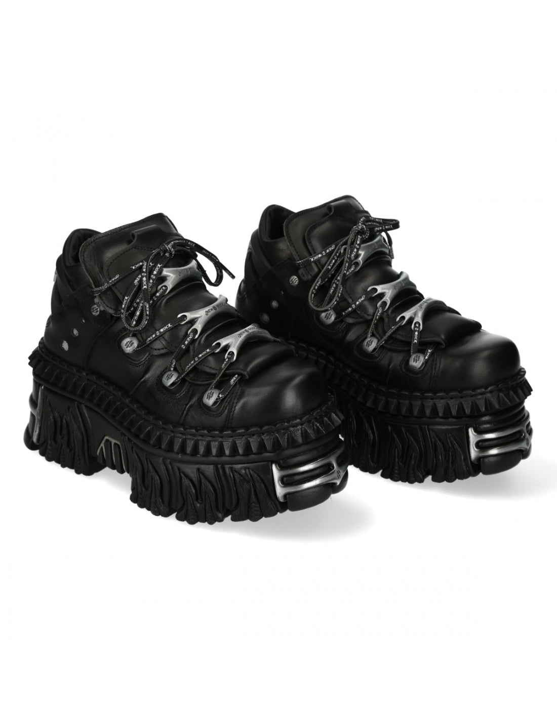Pair of black platform boots on a white background