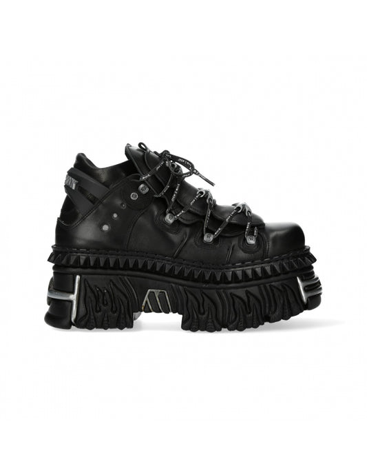 Black high-top sneakers with thick soles on a white background