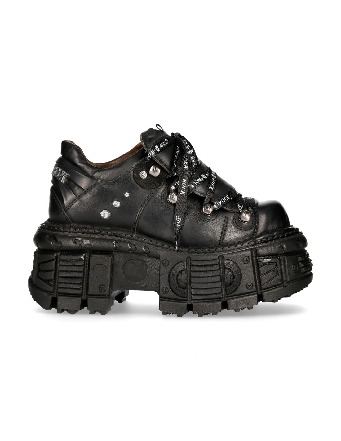 Black platform sneaker with unique design elements on a white background