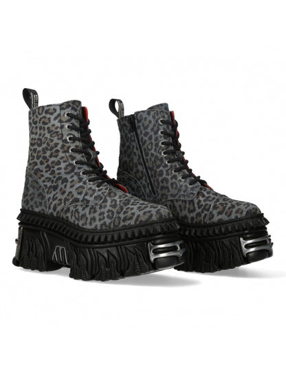 Pair of gray leopard print boots with black soles on a white background
