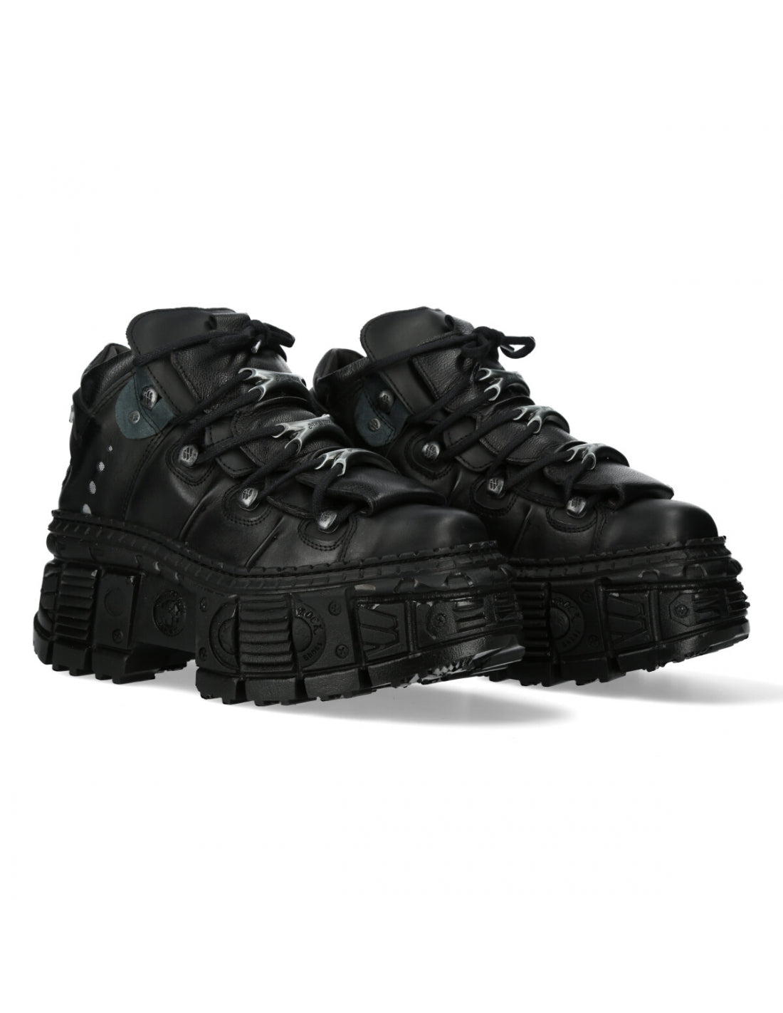Pair of black high-top sneakers on a white background