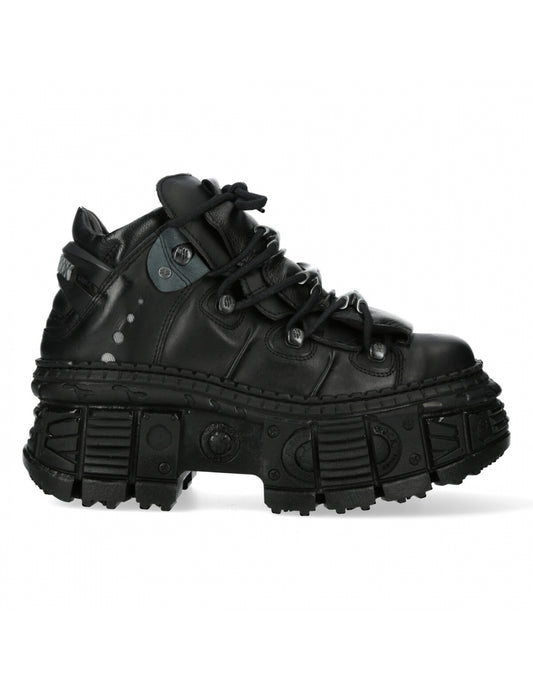 Black high-top sneaker with thick sole on a white background